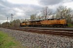 UP 6446 leads a coal drag Nb.